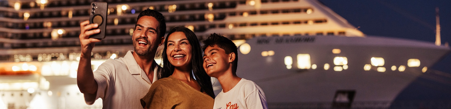 A family enjoys the Wi-Fi package on board an MSC Cruise