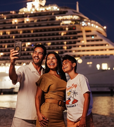 A family enjoys the Wi-Fi package on board an MSC Cruise