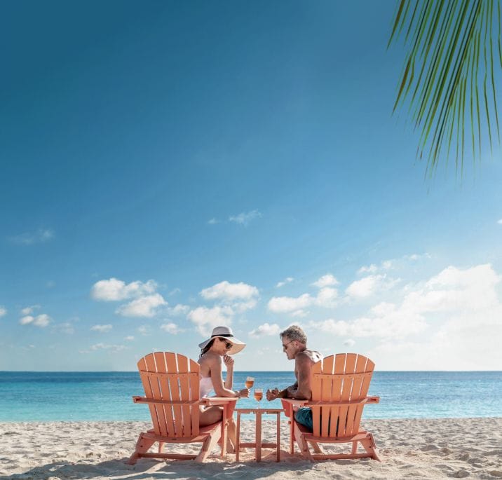 A couple enjoying drinks on their MSC Cruise vacation