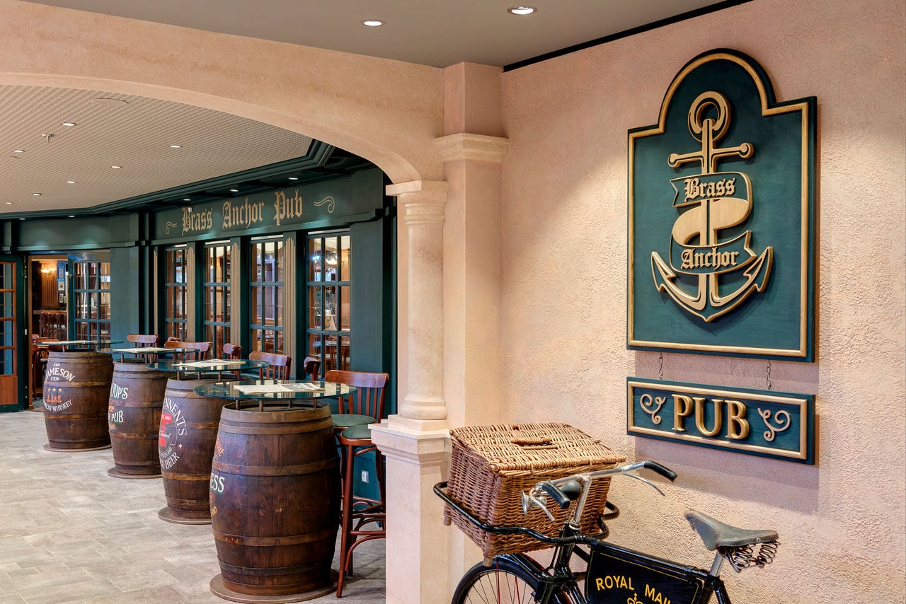 Brass Anchor Pub features barrel decor and comfy seating aboard MSC Meraviglia | MSC Cruises