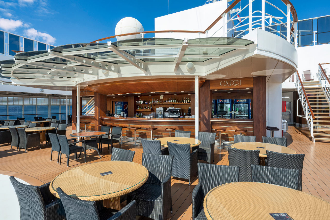The Capri Bar on MSC Sinfonia features an outdoor seating area with sea views | MSC Cruises