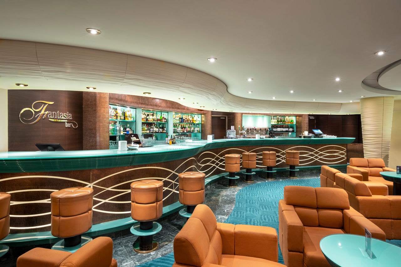 Fantasia Bar features comfortable seating and a welcoming ambiance for guests | MSC Cruises