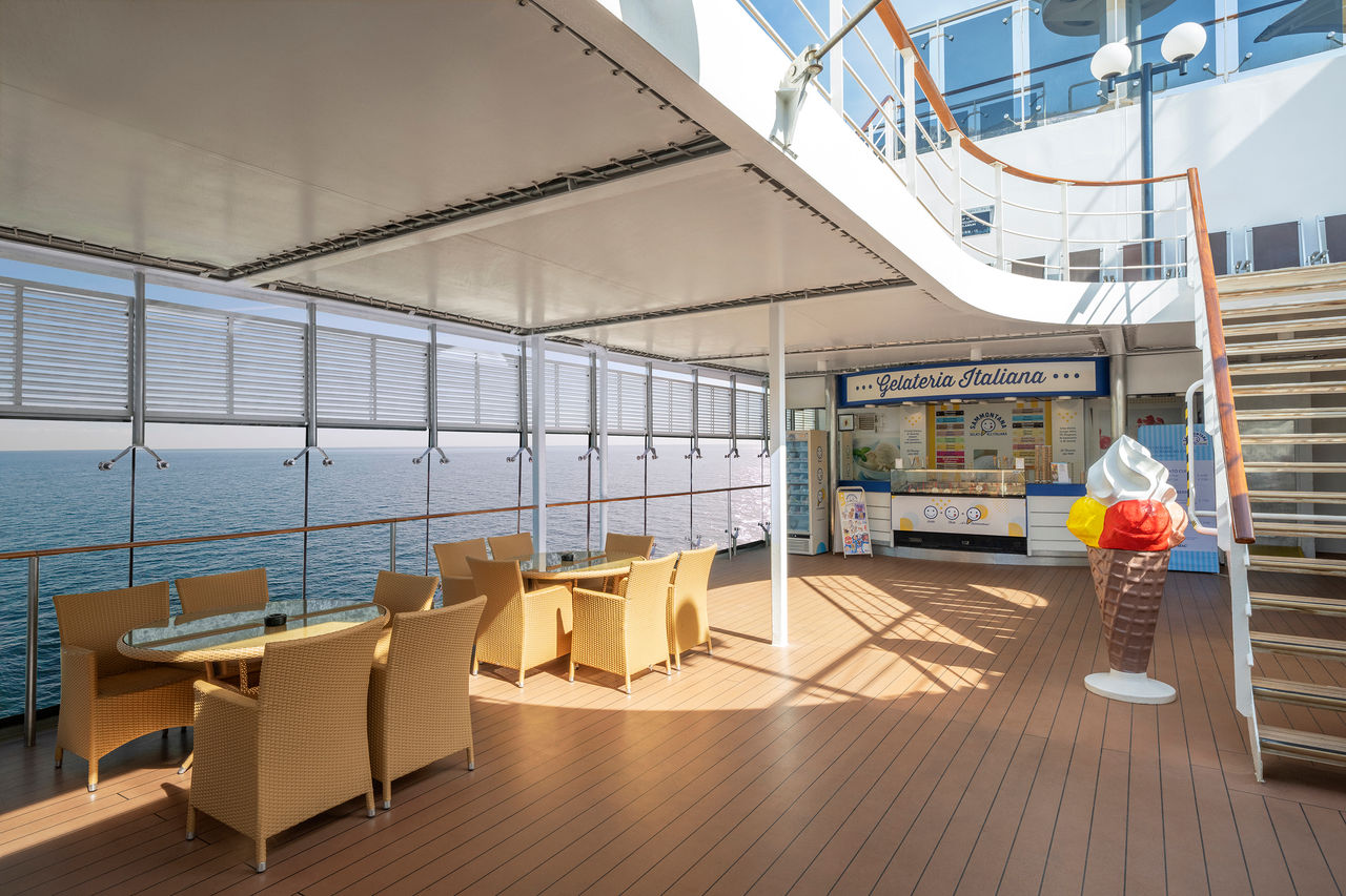 The Italian Ice Cream Bar features outdoor seating with a relaxing sea view | MSC Cruises