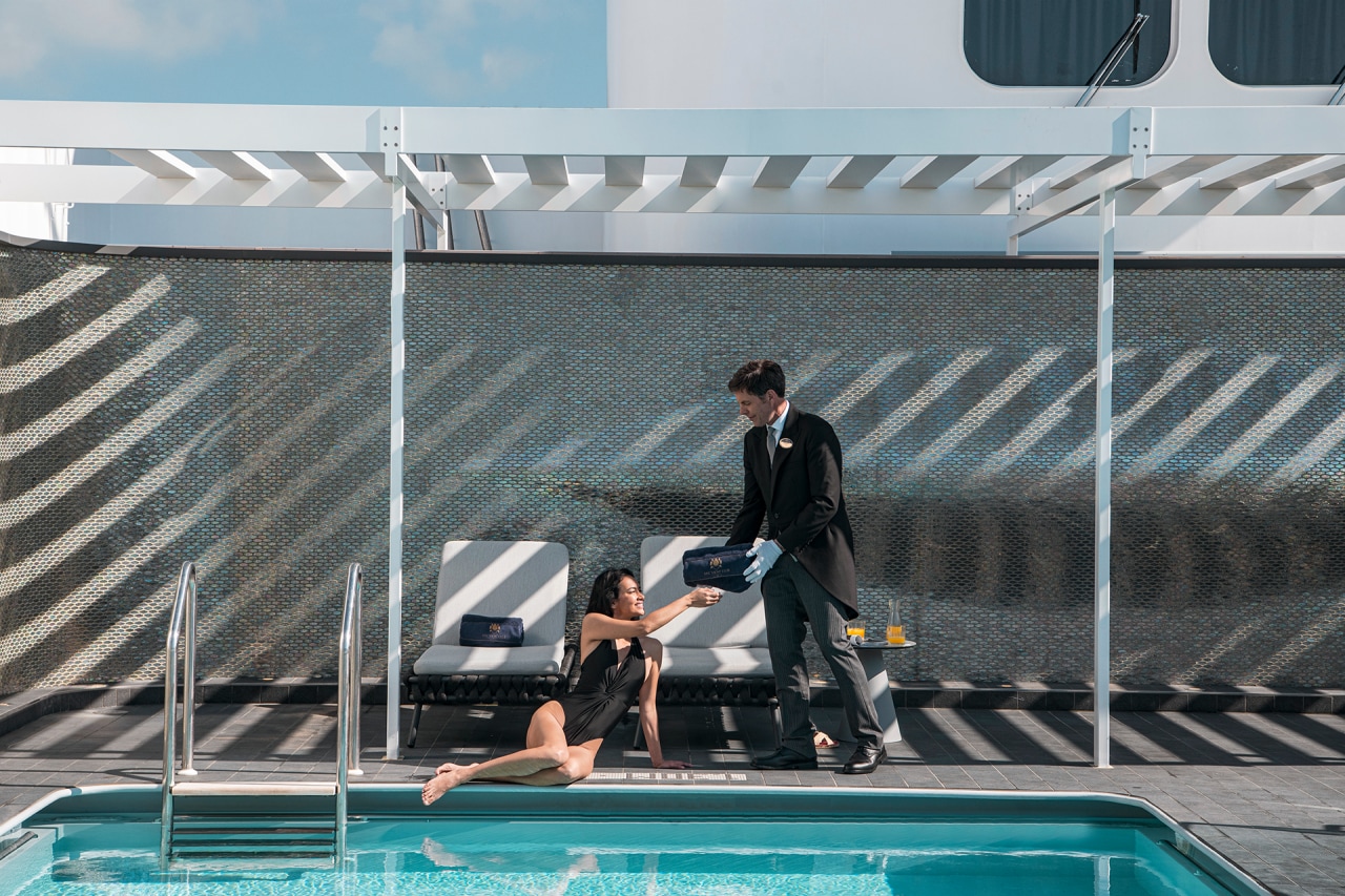Poolside drink service at the MSC Yacht Club Sundeck Bar | MSC Cruises