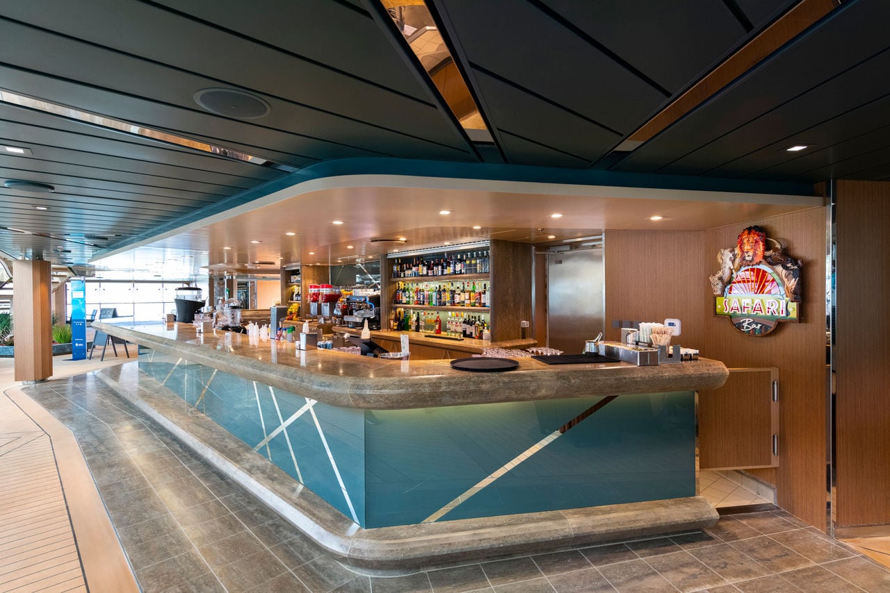 Safari Bar featuring modern décor and a spacious bar counter on MSC Grandiosa | MSC Cruises