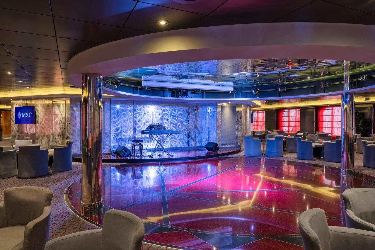 Sinfonia Lounge on MSC Sinfonia features a dance floor and inviting seating areas | MSC Cruises