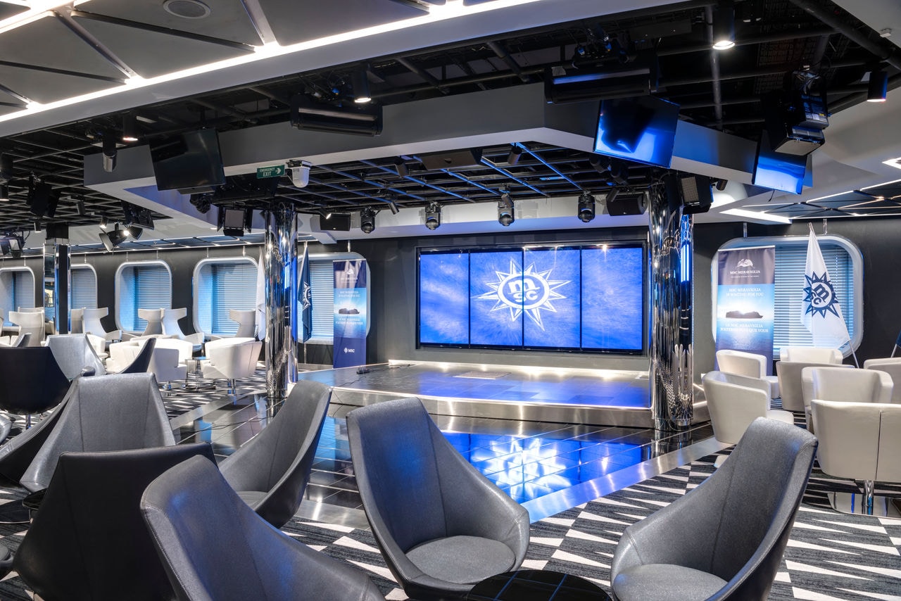 TV Studio & Bar on MSC Meraviglia features comfortable seating and contemporary screens | MSC Cruises