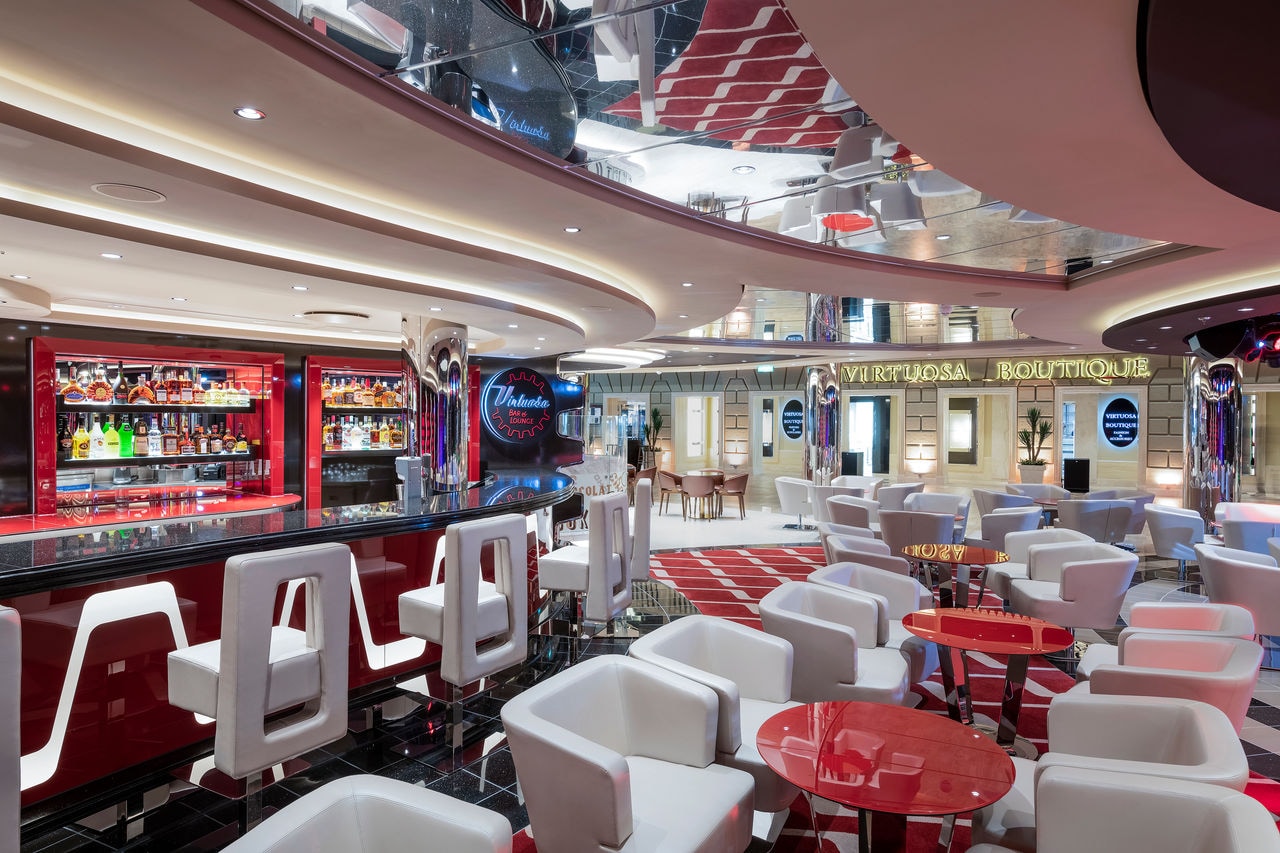 Virtuosa Bar & Lounge on MSC Virtuosa features inviting seating areas and a vibrant ambiance | MSC Cruises