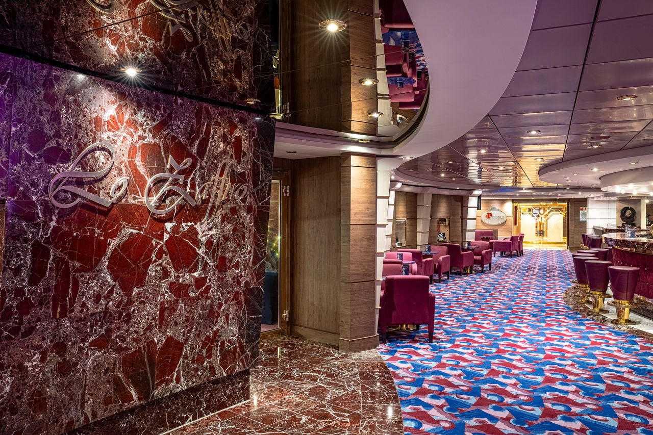 Inviting bar with contemporary décor and cozy seating area aboard MSC Orchestra | MSC Cruises
