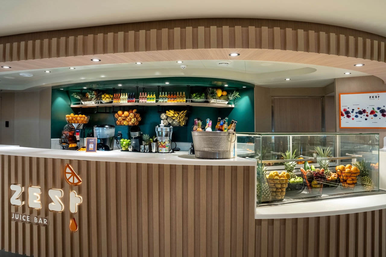 Zest Juice Bar featuring fruit and bottles on the counter aboard MSC World Europa | MSC Cruises