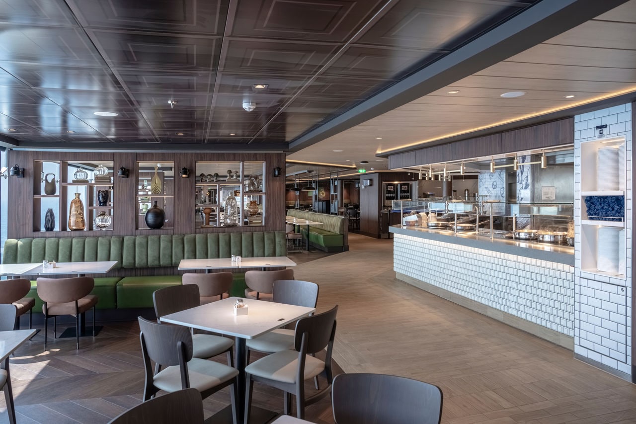 A spacious restaurant area with modern decor and seating, inviting guests to enjoy their dining experience | MSC Cruises