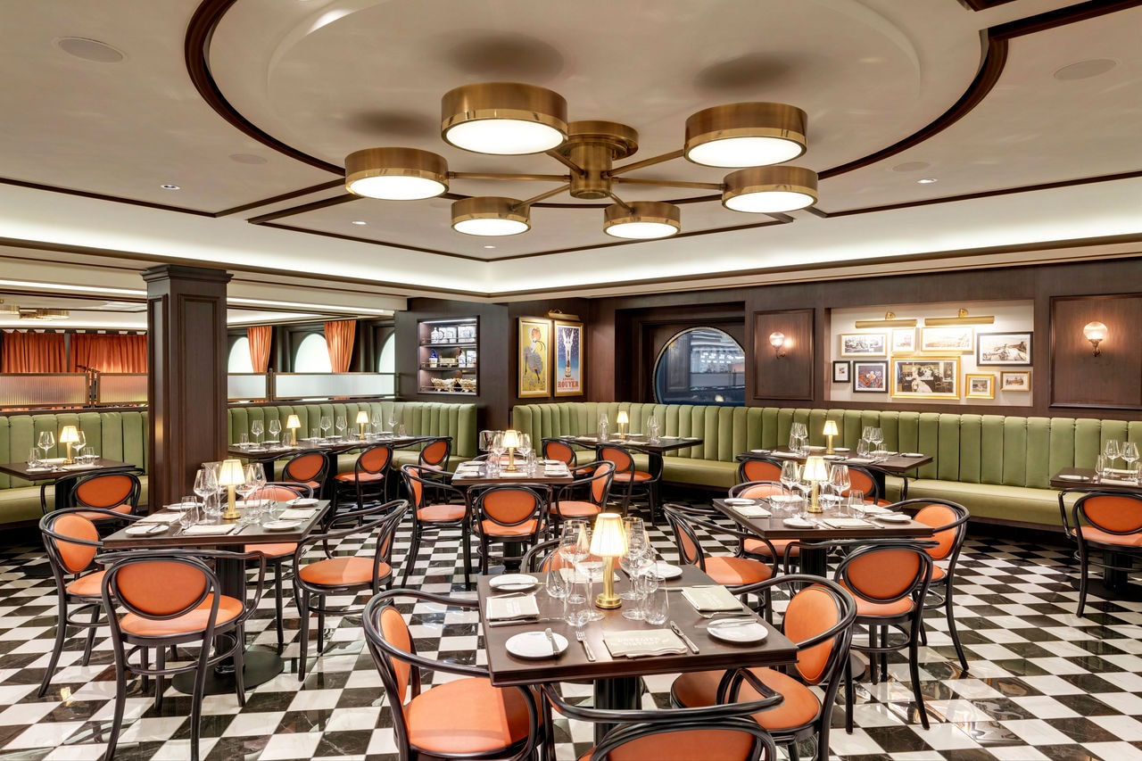 Contemporary bistro with vibrant seating and artistic décor on MSC Grandiosa | MSC Cruises