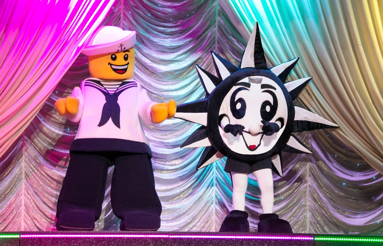 Children enjoy LEGO activities and Doremi mascot on stage during onboard entertainment | MSC Cruises