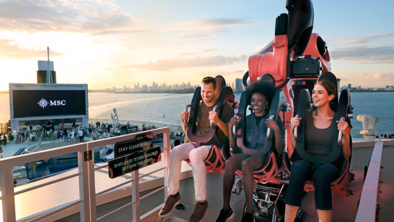 A group of friends enjoys a beautiful sunset in Miami on the deck of MSC Seascape | MSC Cruises