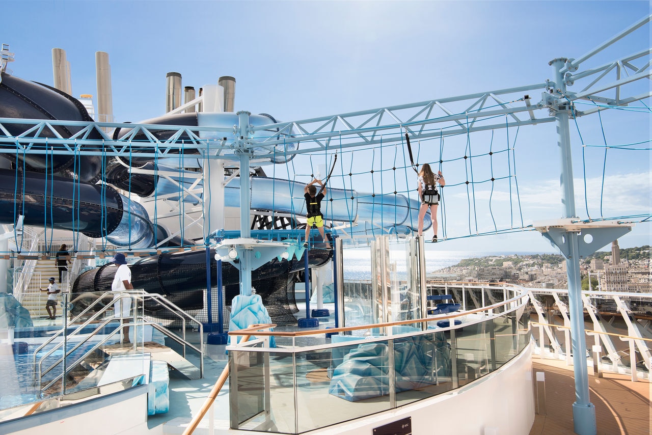 Guests enjoy rope bridges and waterslides at the Polar Aquapark on MSC Meraviglia | MSC Cruises