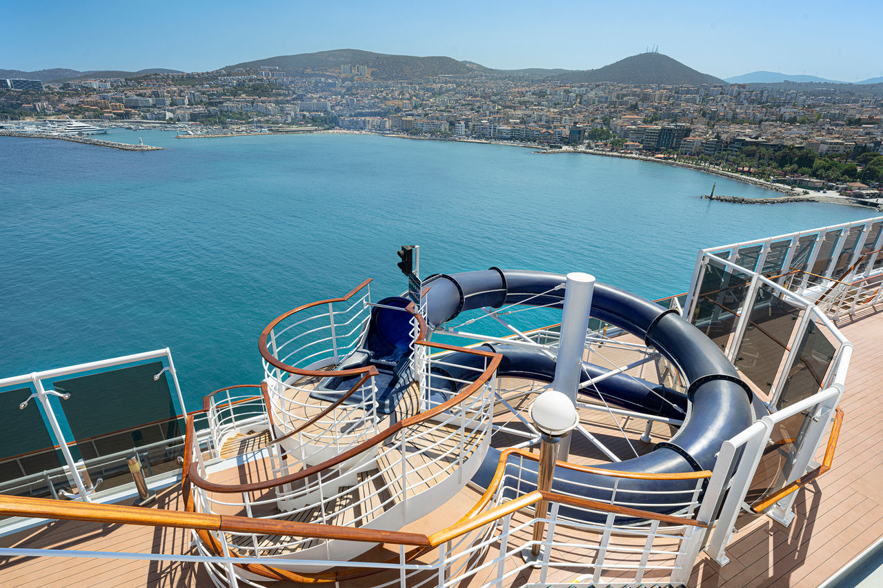 Waterslide on MSC Splendida overlooking the sea and mountains | MSC Cruises