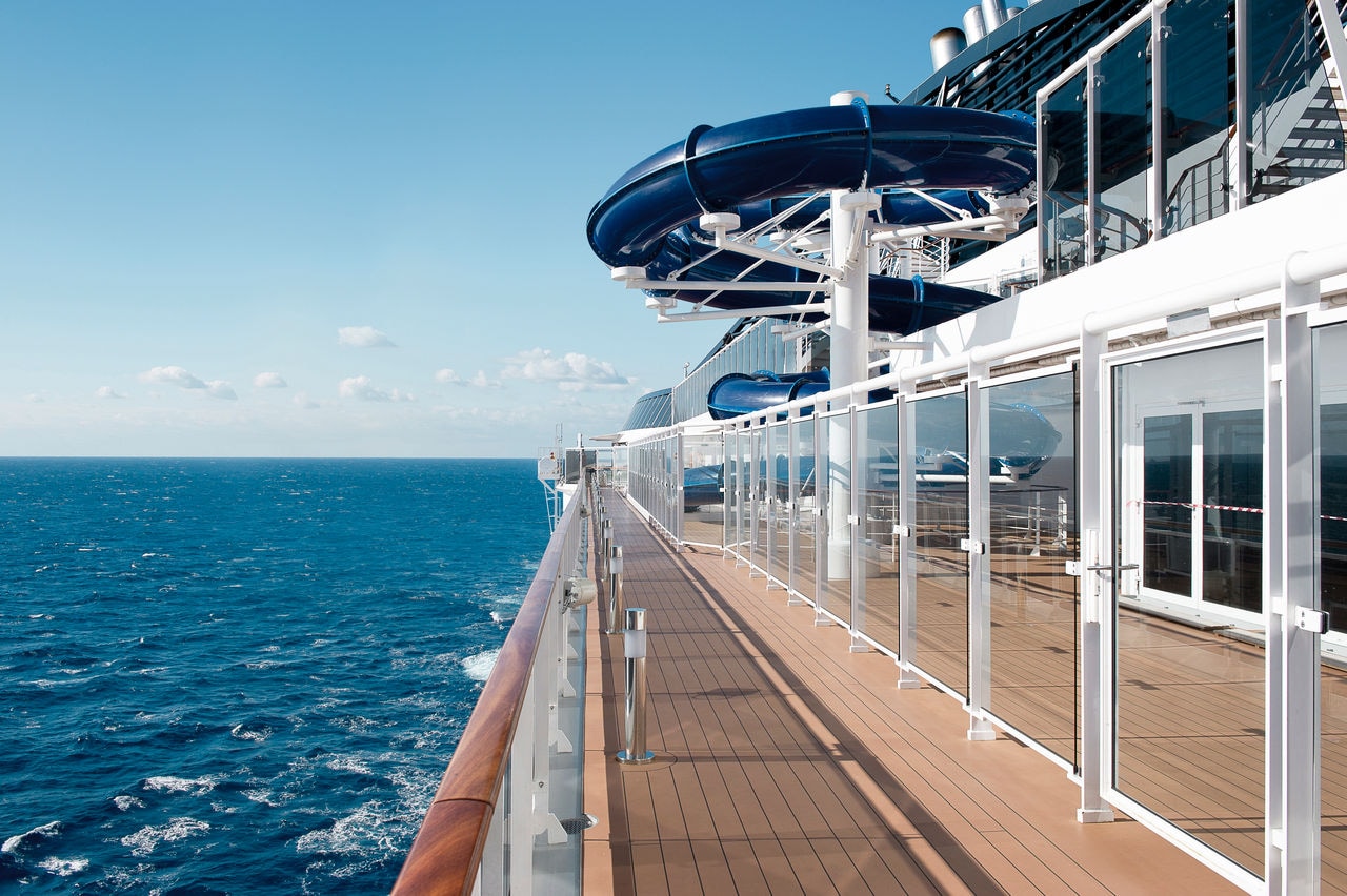 The deck of MSC Divina with panoramic sea views and a waterslide for teens | MSC Cruises