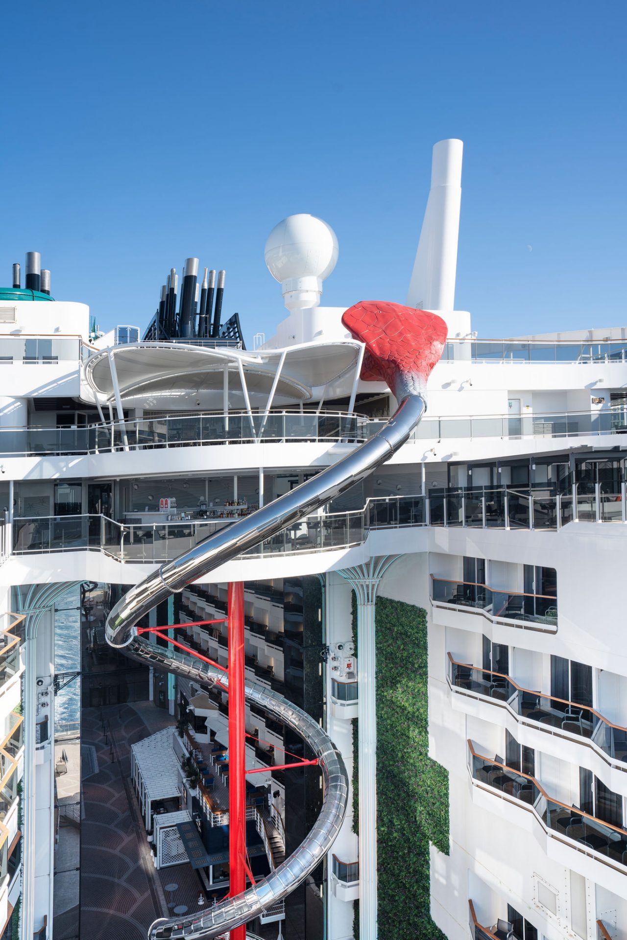 Spectacular spiral slide in the entertainment area of MSC World Europa | MSC Cruises