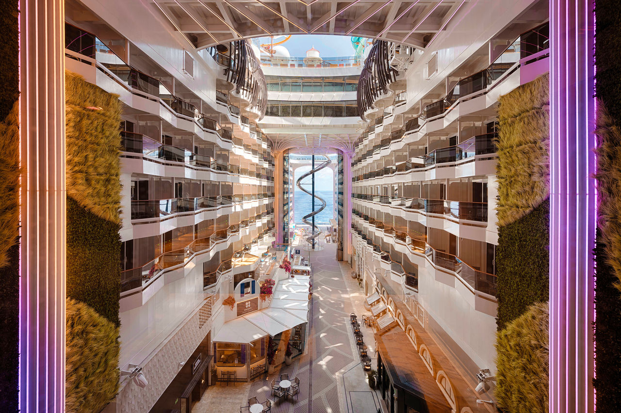 MSC World America interior featuring stylish spaces and a sea view through the promenade | MSC Cruises